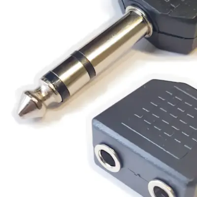 Detalles accesorios de Adaptador Plug 6,5 Estereo Macho A 2 Miniplug 3,5 Estereo Hembra