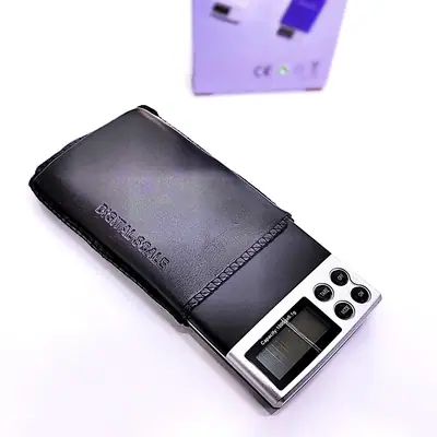 Vista lateral de Balanza digital de bolsillo hasta 1 kg